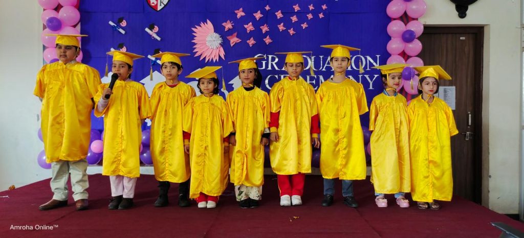 graduating students deliver a speech.